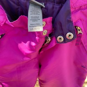 2 pairs of snow pants